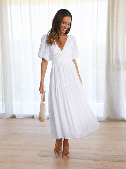 Claudia® | Ruffle midi dress with V-neck and puff sleeves