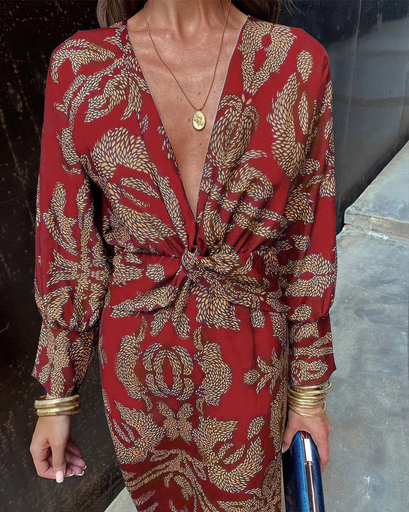 Claudia® | Elegant long-sleeved dress with floral print
