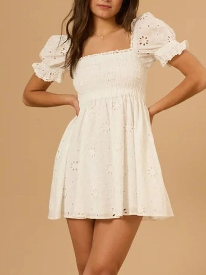 Maddalena® | Puff Sleeve Open Back Mini Dress
